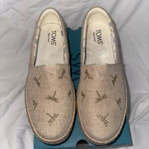 TOMS Natural Canvas Slip-Ons with Gold Embroidery